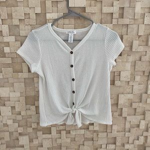 White button down shirt with tie and the bottom